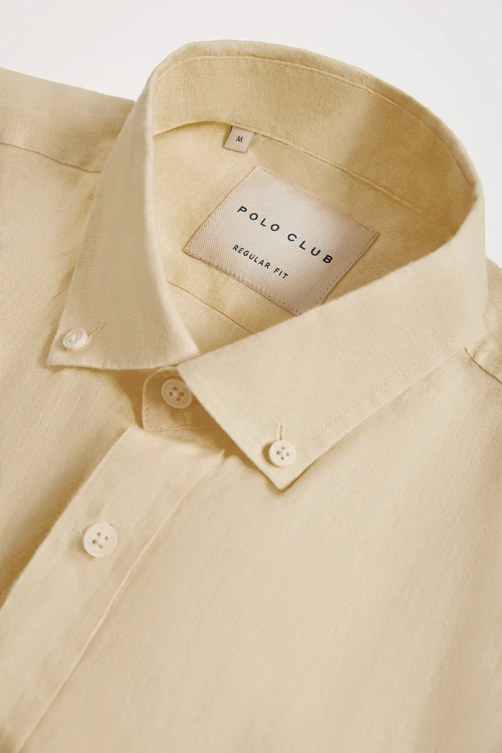 Camisa de lino beige con logo bordado