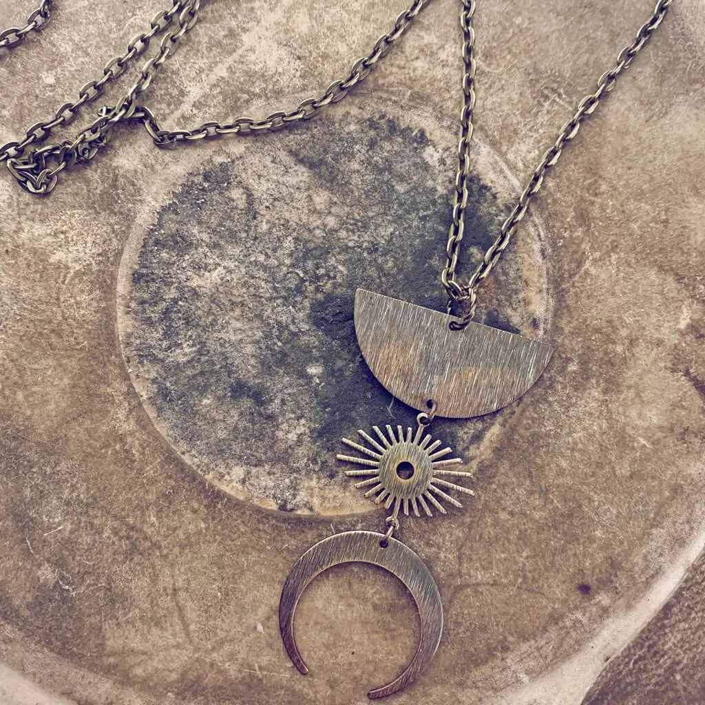 umbra // antiqued half moon, sunburst & crescent moon boho brass necklace