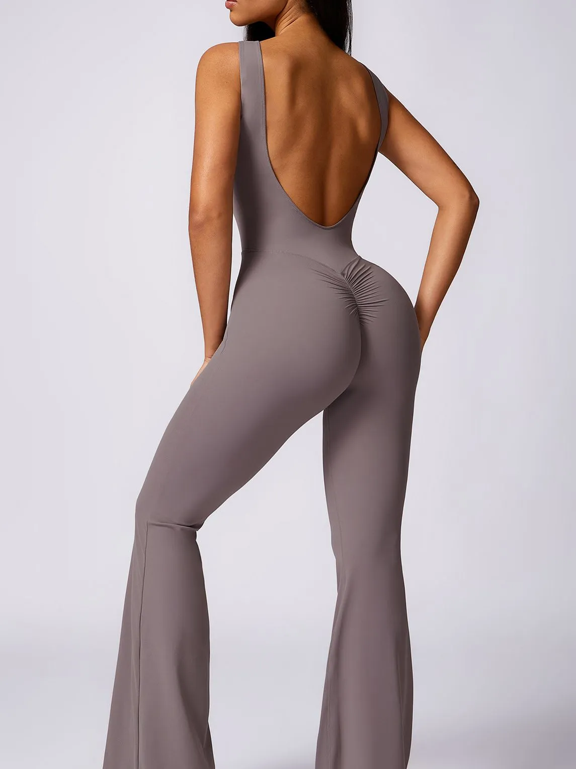 ZASUWA Female Backless Elastic Tight Scrunch Bum Flare Jumpsuit